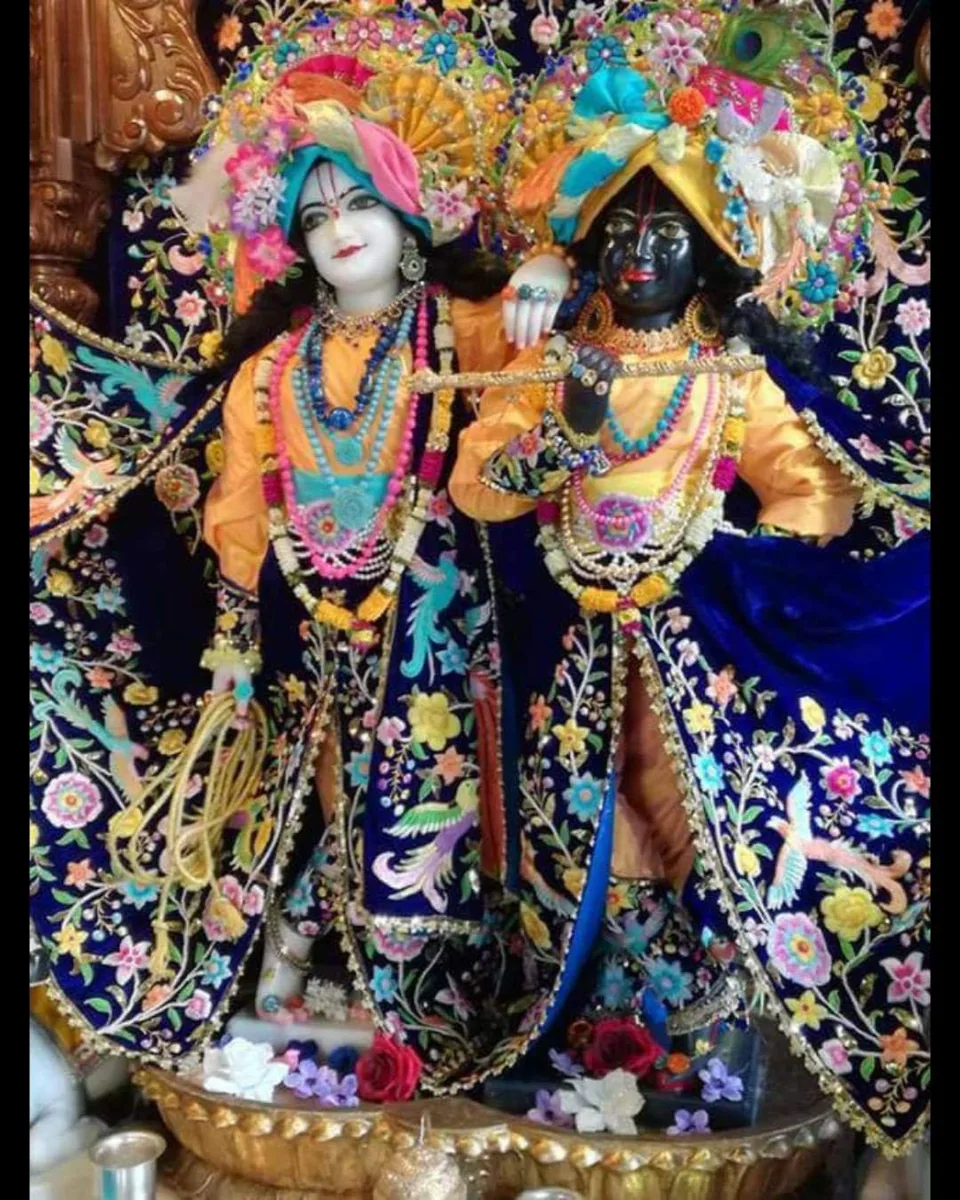 Deities wearing colorful ceremonial attire